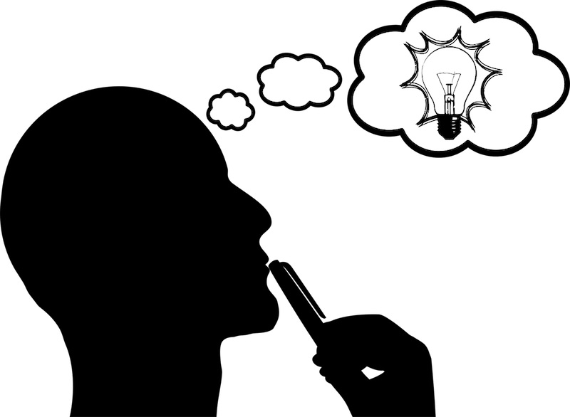 An idea bubble with a lightbulb is above an outline of a thinking head